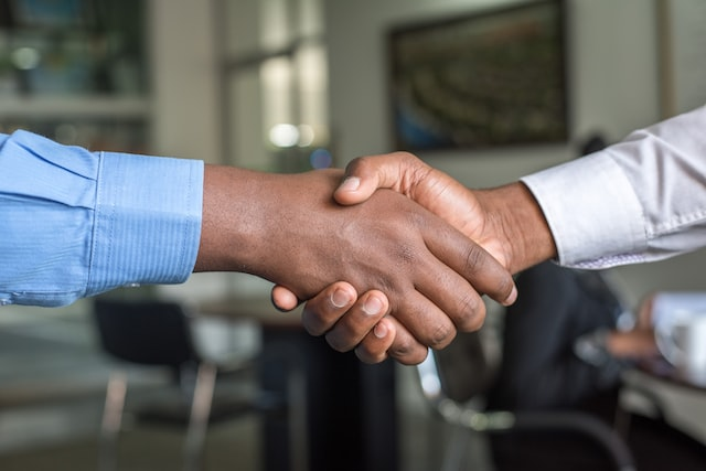 A client shaking hands with a customer